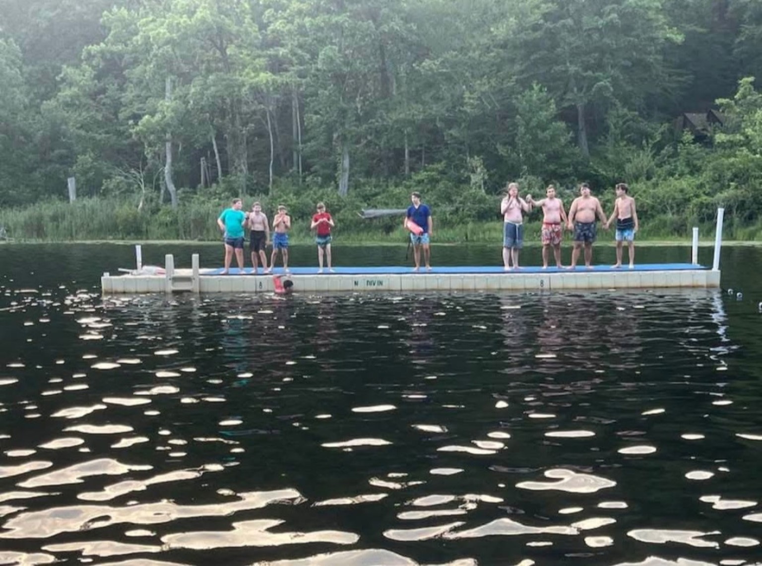 Troop 288 Scouts gathered on a dock during a waterfront activity